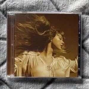 Taylor Swift CD Album with Gold Cover